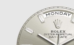 The 40 mm copy Rolex Day-Date 40 228349RBR watches have silvery dials.